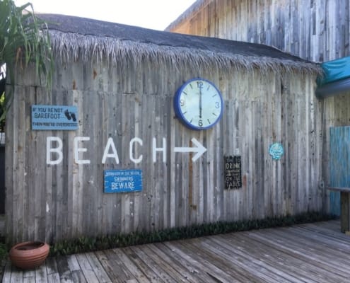 ferntouristik_unterwegs_Malediven_Finolhu_Weg-zum-Strand